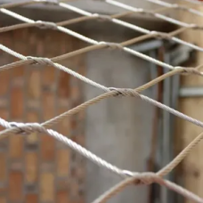 Сетка нержавеющая тросовая с узловым креплением и ромбической ячейкой Н1 7х7 AISI 316 25х43х1 мм